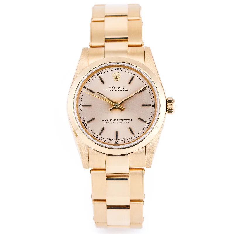 men's Rolex watches with fluted bezel -​Rolex Oyster Perpetual 31 | REF. 67488 | Champagne Dial | 18k Yellow Gold | 1990