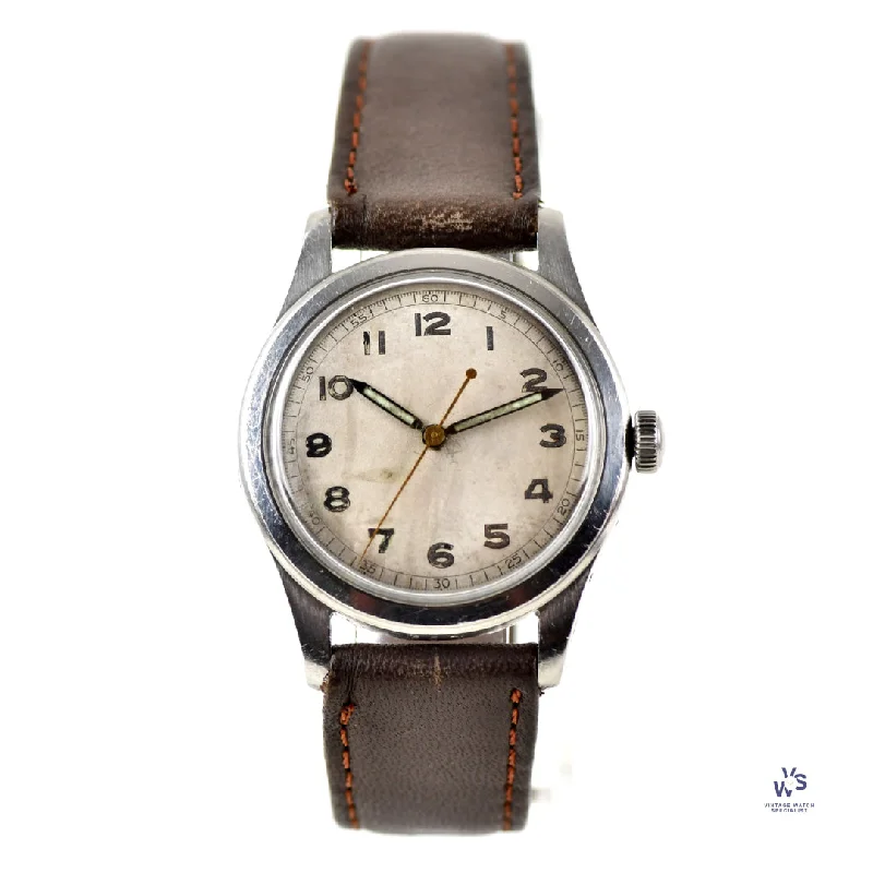 Men's Military Watches for Risk Assessment-Tavannes Watch Co. - Unsigned Military Style Dial with Arabic Numerals - c.1940